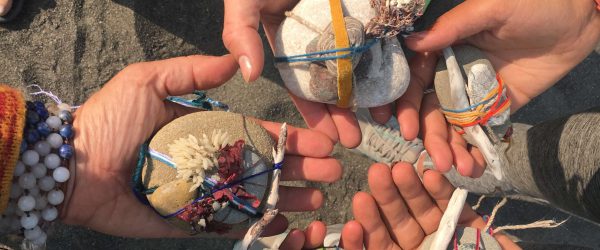 Hands holding treasure from the sea